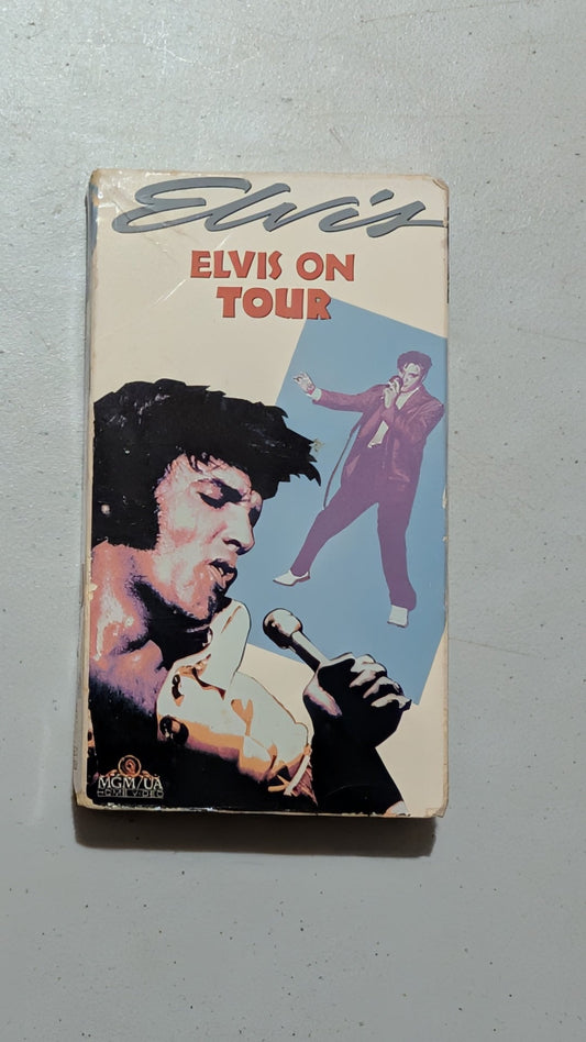 Elvis on Tour from MGM/UA Home Video - 1980s Media (VHS Cassette, Cardboard VHS Tape, Film Memorabilia, Retro, Cream, Red, Purple, Collectable, Vintage, Original)