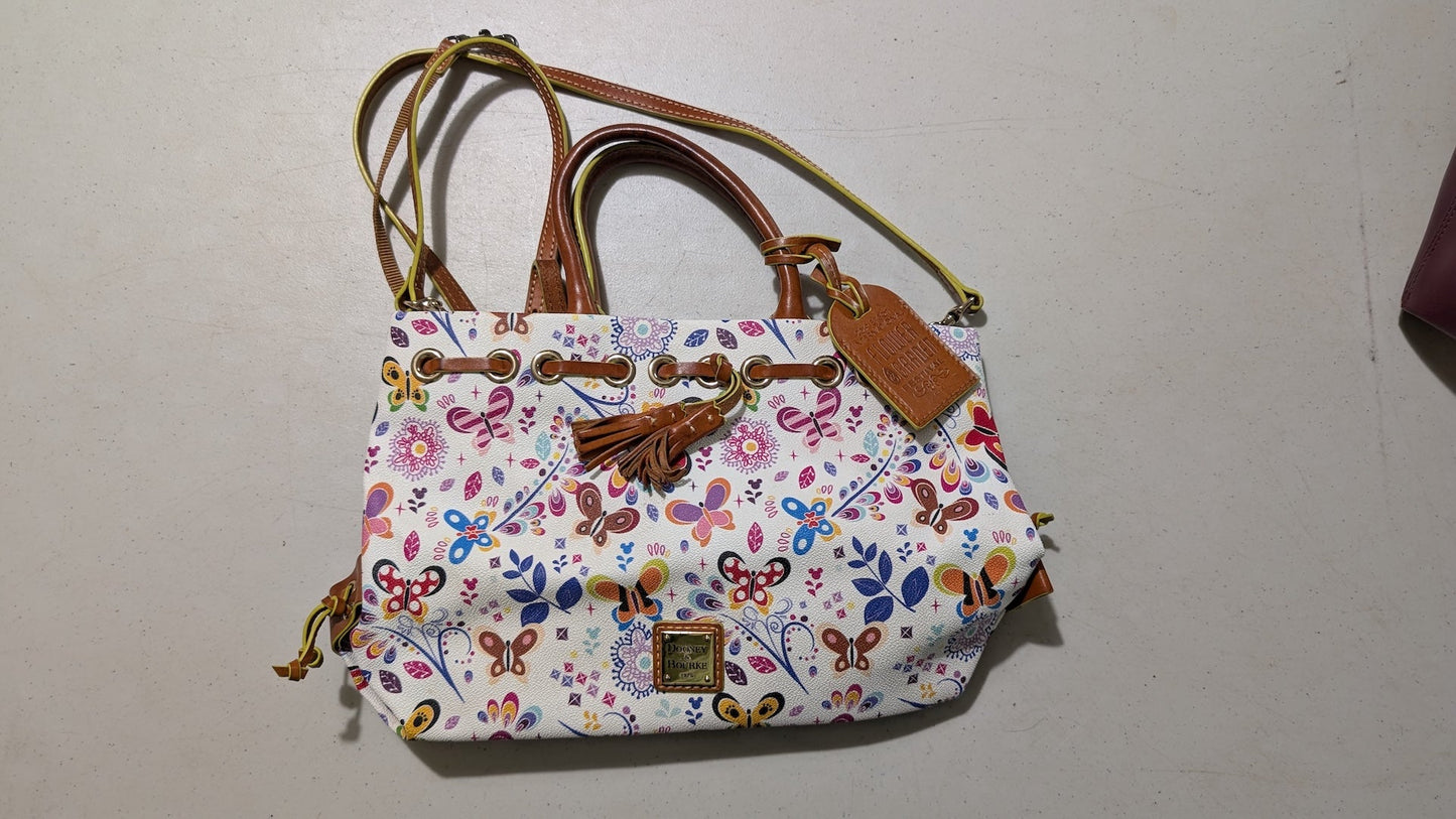 Gretta Handbag from Dooney & Bourke - 2019 Passholder Exclusive Handbag (Coated Cotton, Leather Drawstring Bag, Butterflies, Abstract, White, Multi-color)