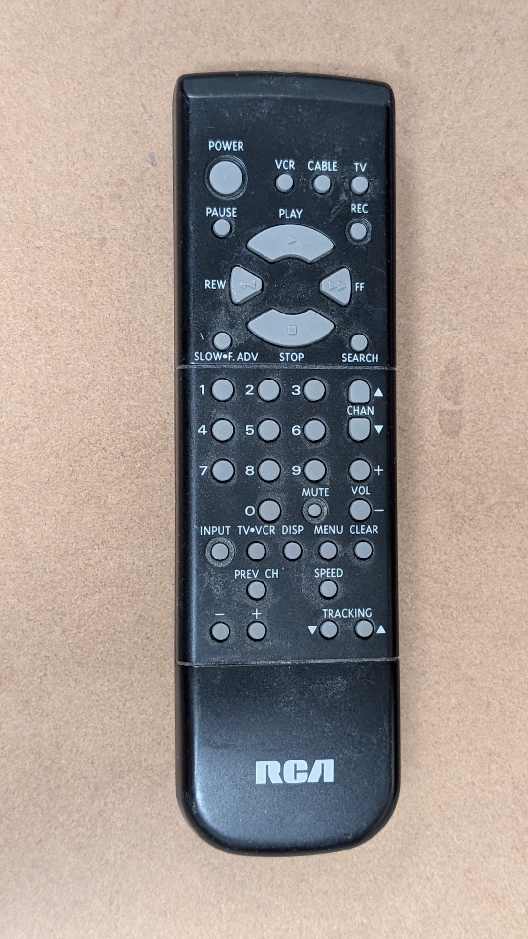 Remote from RCA - 1990s Electronics > Accessories > Remote Controls (Plastic, Rubber Universal Remote, Utilitarian, Black)