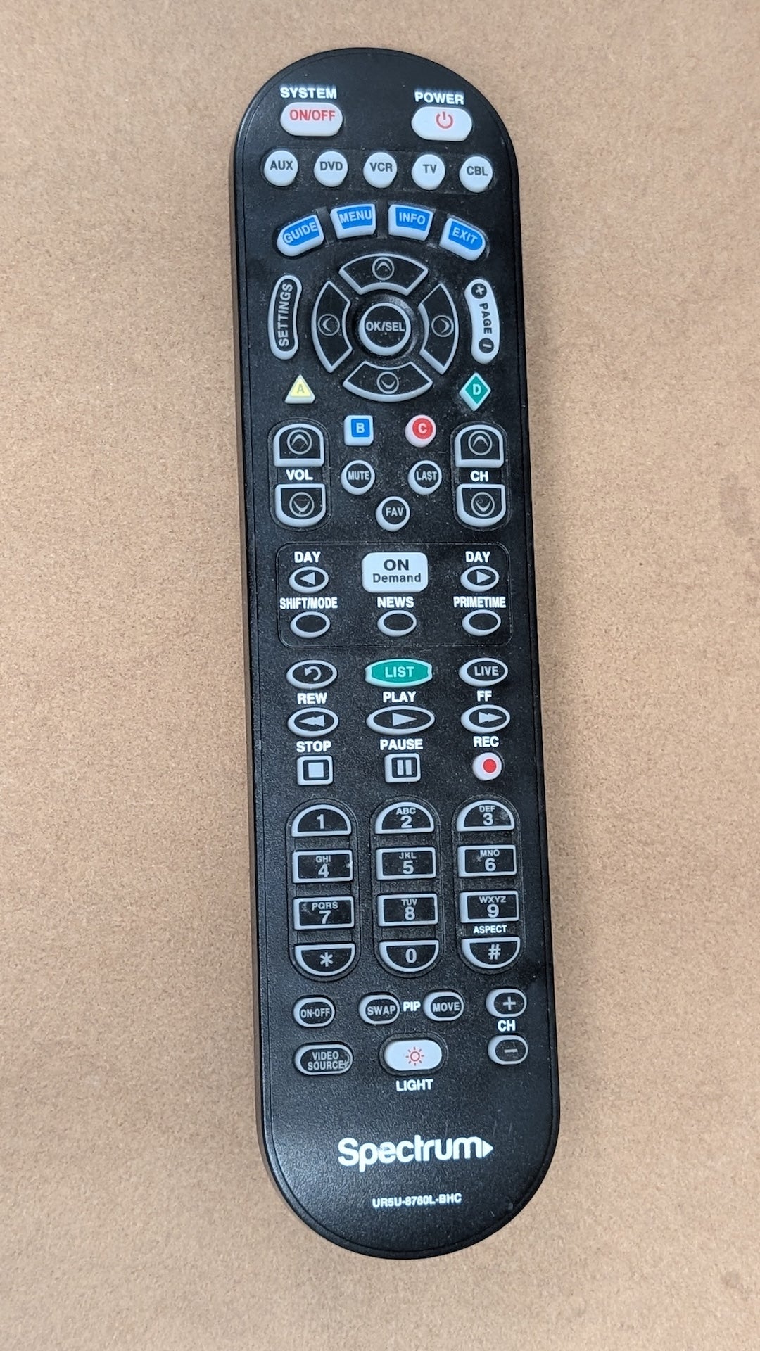 UR5U-8780L-BHC from Spectrum - 2010s Electronics > Accessories > Remote Controls (Plastic Rubber Cable Box Remote, Utilitarian, Black)