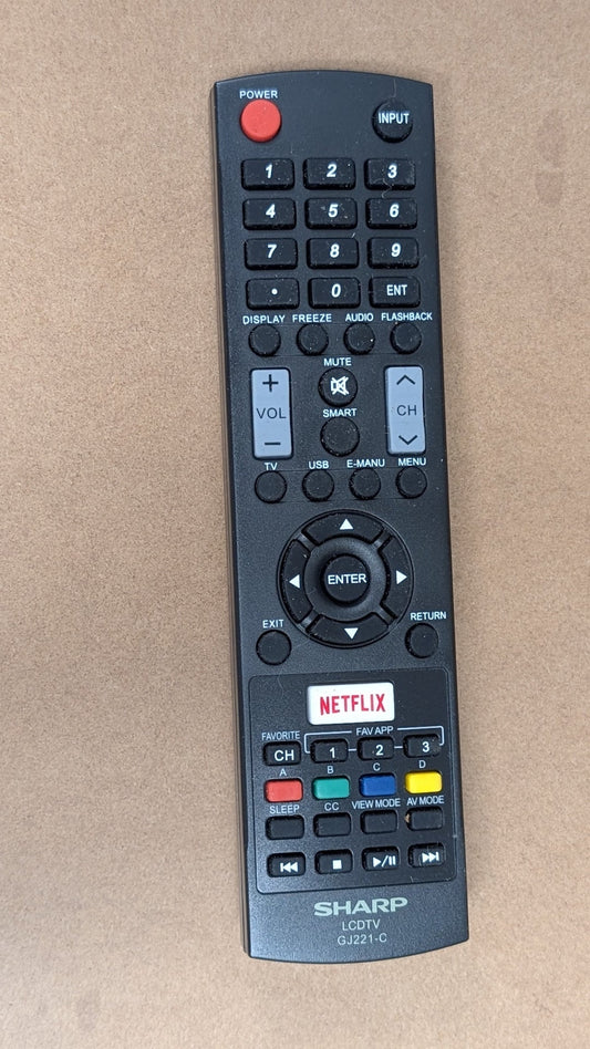 GJ221-C from Sharp - 2010s Electronics > Accessories > Remote Controls (Plastic Rubber LCD TV Remote, Utilitarian, Black)
