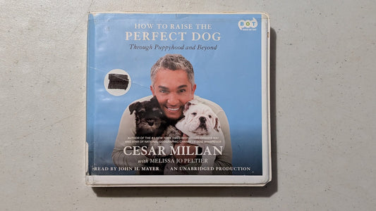How to Raise the Perfect Dog: Through Puppyhood and Beyond by Cesar Millan with Melissa Jo Peltier (Non-fiction, Pets, Audiobook on CD, 2009, Former Library Book)