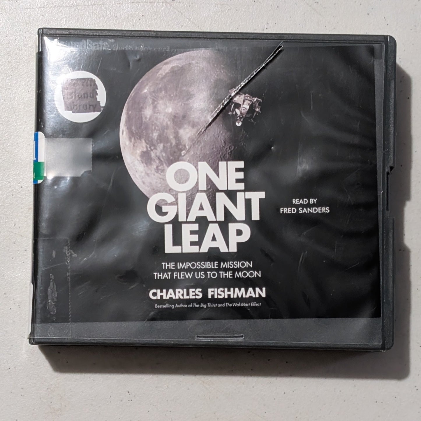 One Giant Leap: The Impossible Mission That Flew Us to the Moon by Charles Fishman (History, Science, Audiobook on CD, 2019, Former Library Book)
