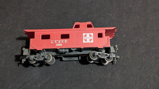Santa Fe Caboose Caboose likely from Tyco/Life-Like - 1970s HO Scale Model Train (Plastic, Metal Caboose, Not Applicable, Red, Black, White)