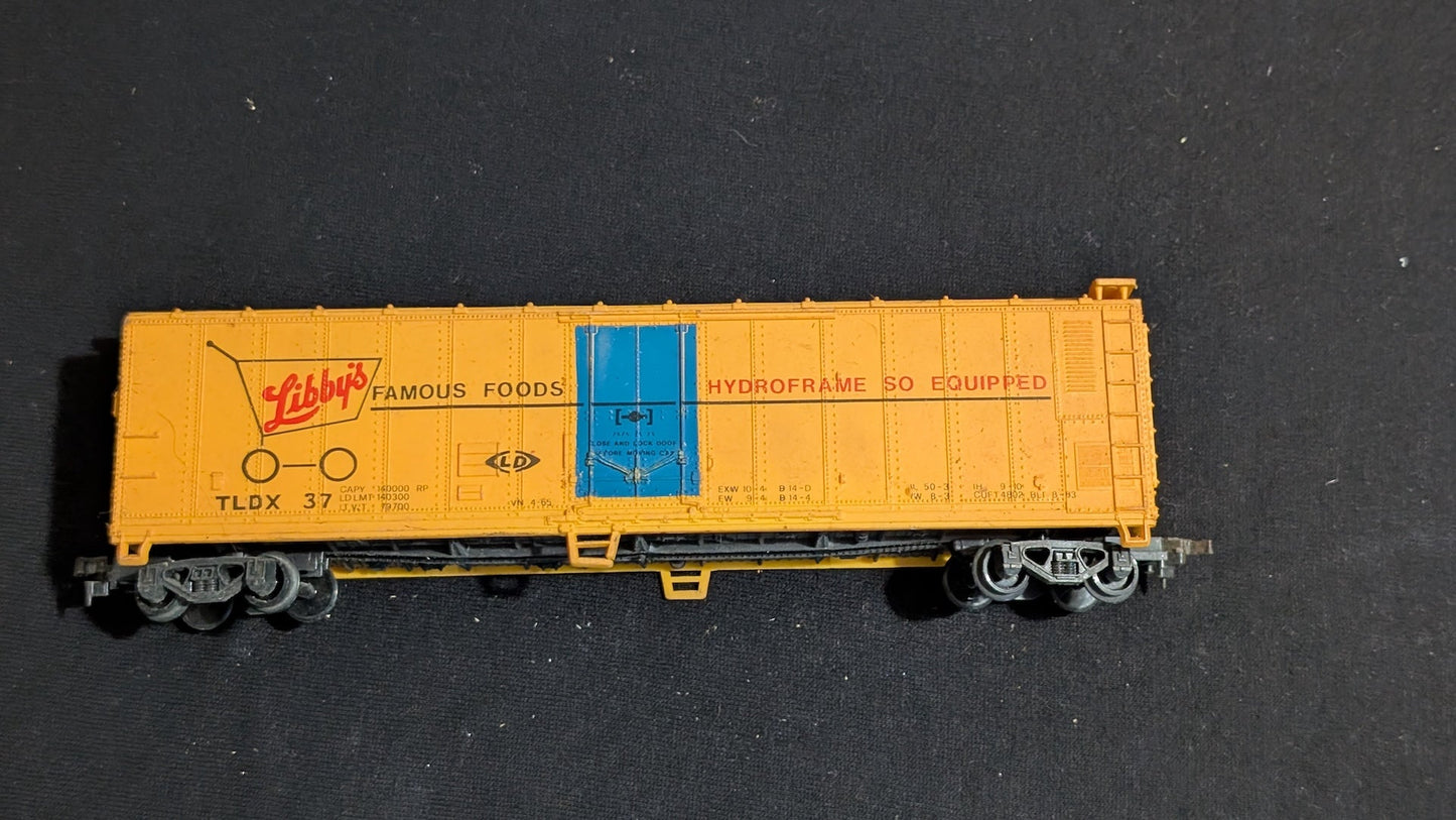 Libby's Famous Foods Boxcar Boxcar likely from Tyco - 1970s HO Scale Model Train (Plastic, Metal Boxcar, Yellow, Blue, Red)