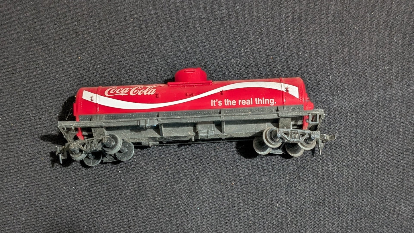 Coca-Cola Tank Car Tank Car likely from Tyco/Life-Like - 1970s HO Scale Model Train (Plastic, Metal Tank Car, Not Applicable, Red, White, Grey)