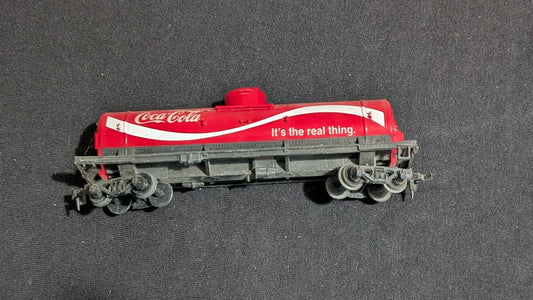 Coca-Cola Tank Car Tank Car likely from Tyco/Life-Like - 1970s HO Scale Model Train (Plastic, Metal Tank Car, Not Applicable, Red, White, Grey)
