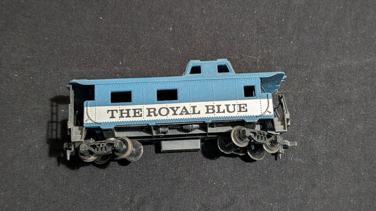 The Royal Blue Caboose Caboose likely from Tyco - 1970s HO Scale Model Train (Plastic, Metal Caboose, Not Applicable, Blue, White)