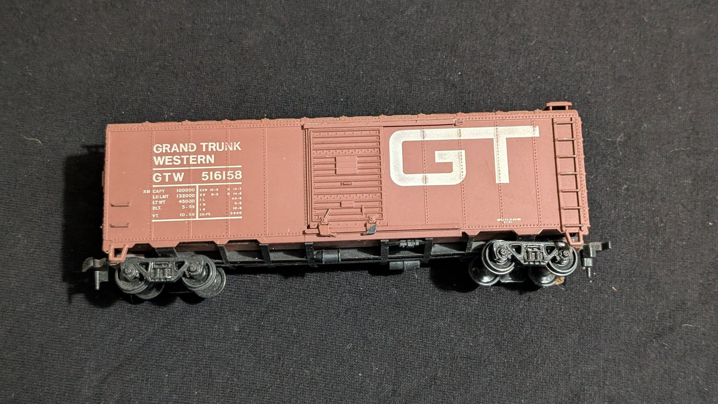 Grand Trunk Western Boxcar Boxcar likely from Athearn - 1980s HO Scale Model Train (Plastic, Metal Boxcar, Not Applicable, Brown, White)