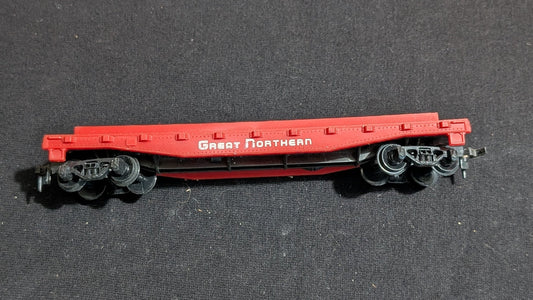 Great Northern Flatcar Flatcar likely from Life-Like/Model Power - 1980s HO Scale Model Train (Plastic, Metal Flatcar, Red, White)