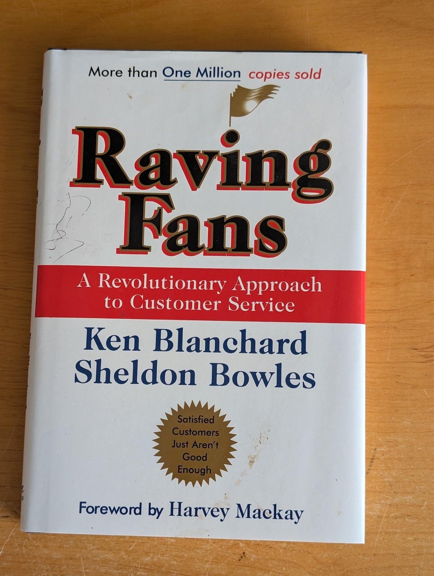 Raving Fans: A Revolutionary Approach to Customer Service by Ken Blanchard & Sheldon Bowles (Business, Management, 1993)