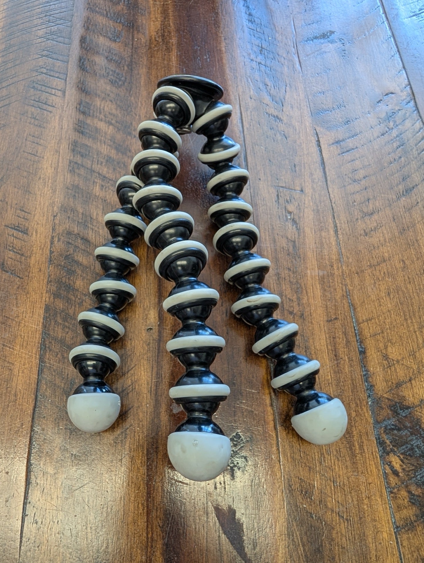 Flexible Octopus Tripod from Generic / Unbranded - 2010s Photography Equipment (Plastic, Rubber, Metal Camera Accessory, Tech, Modern, Black, White, tripod, camera mount, phone holder, stabilizer, gear)