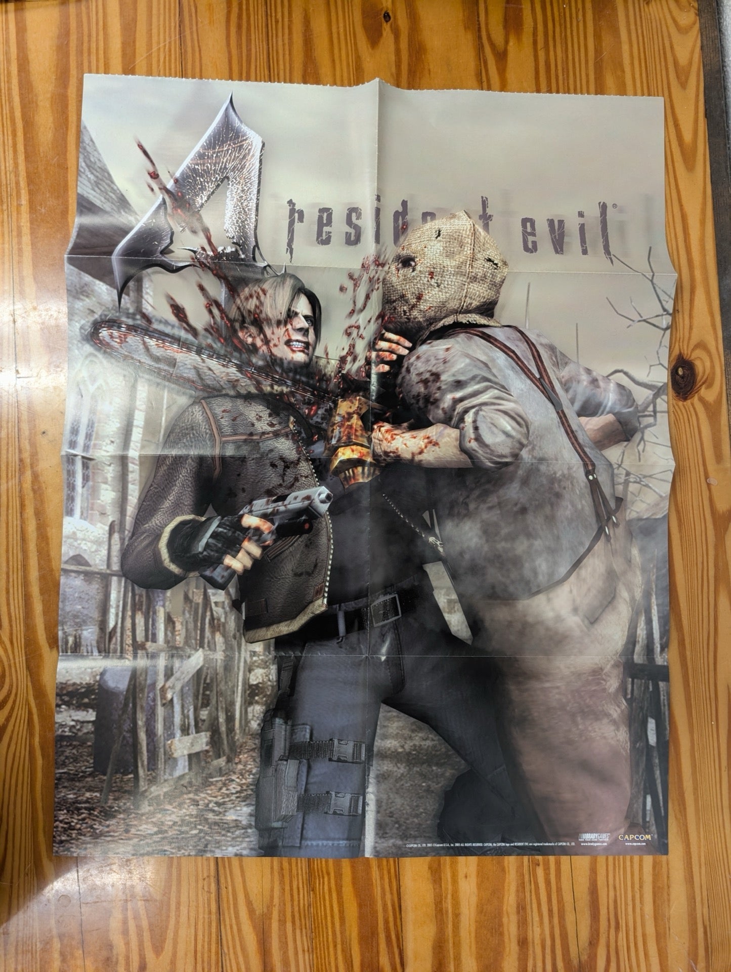 Resident Evil 4 Poster Leon Kennedy vs Chainsaw Man BradyGames Guide Insert