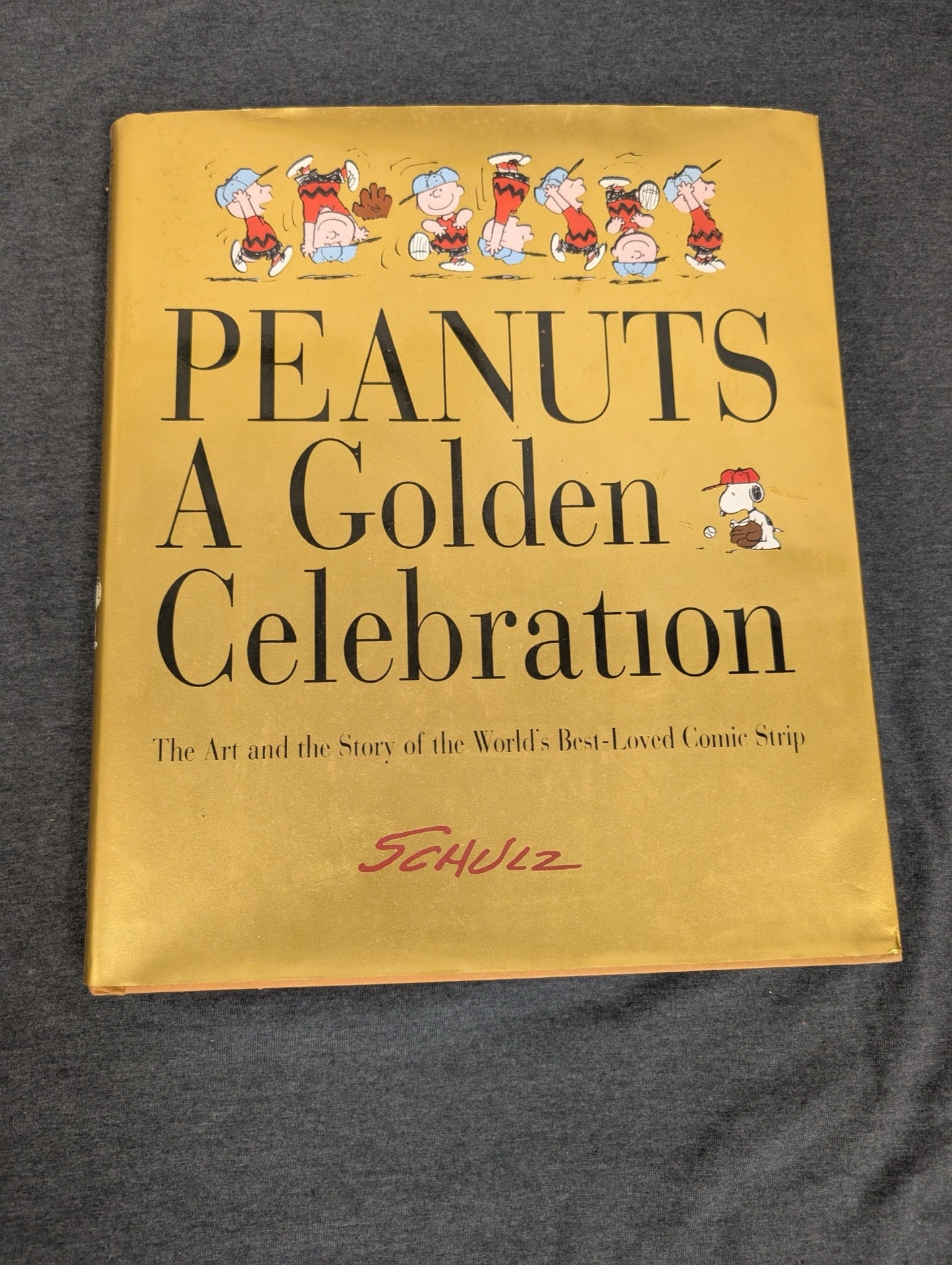 Peanuts: A Golden Celebration by Charles M. Schulz (Hardcover Coffee Table Book)
