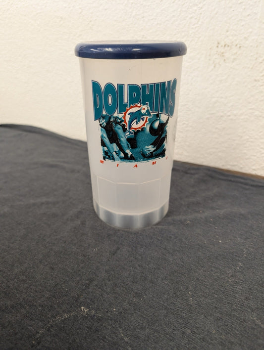 Translucent plastic tumbler with a blue lid and a vintage Miami Dolphins football graphic.