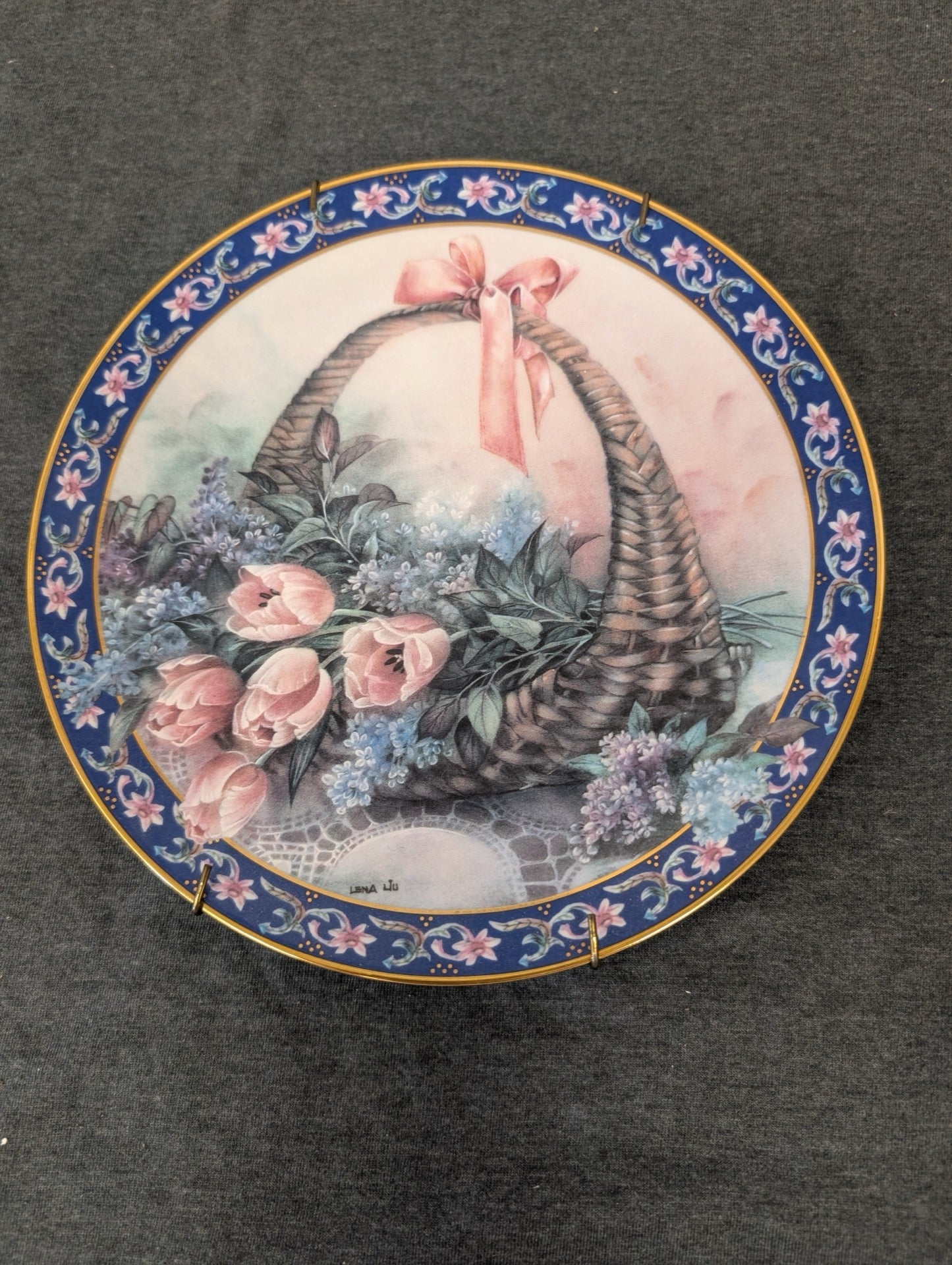 Lena Liu Tulips and Lilacs collector plate with pink ribbon on basket handle