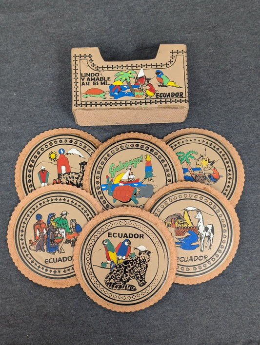 Set of six round leather coasters painted with Ecuadorian scenes and a matching holder.