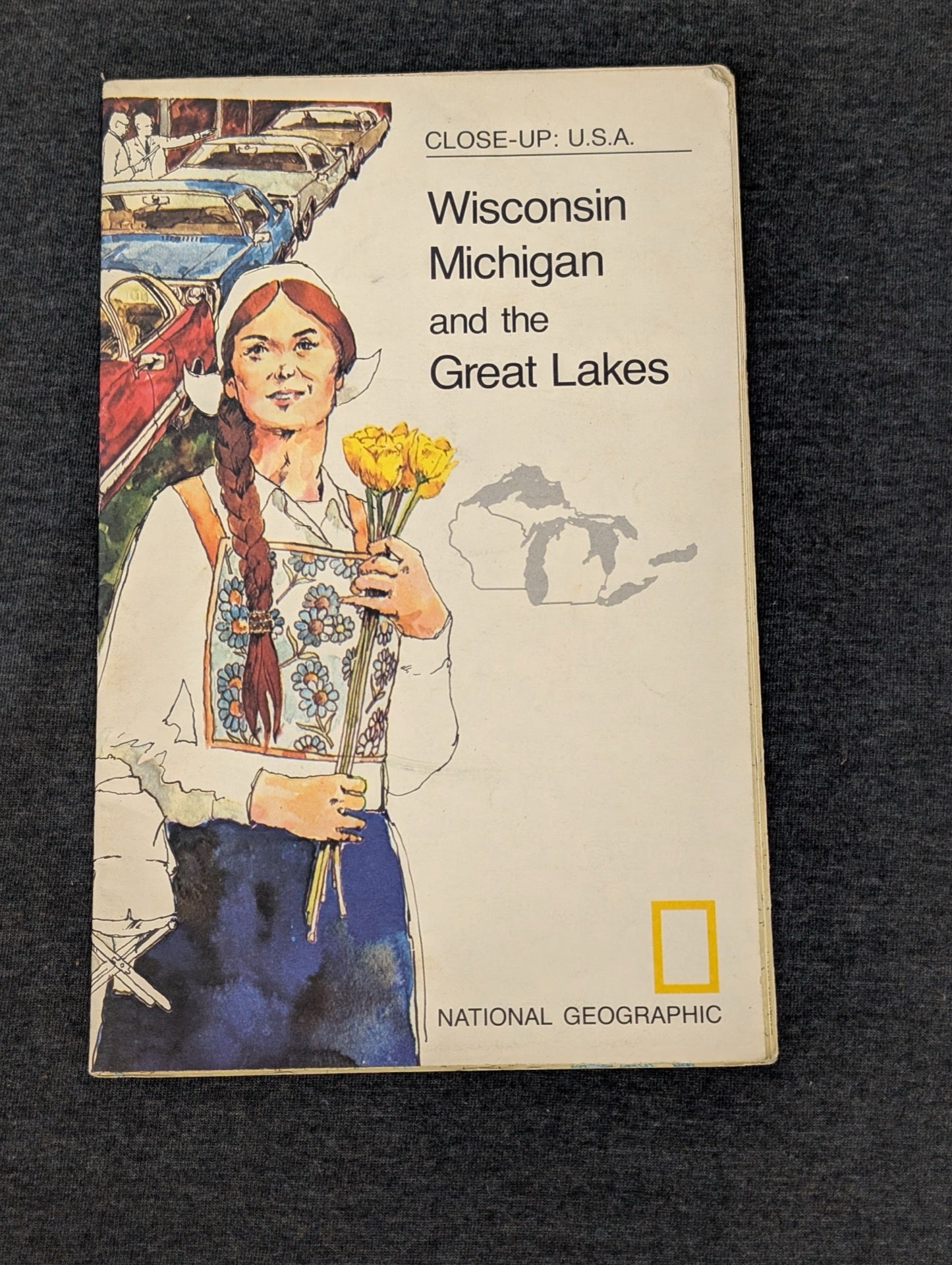 Cover of National Geographic Close-Up U.S.A. Wisconsin Michigan and the Great Lakes featuring a woman with flowers.
