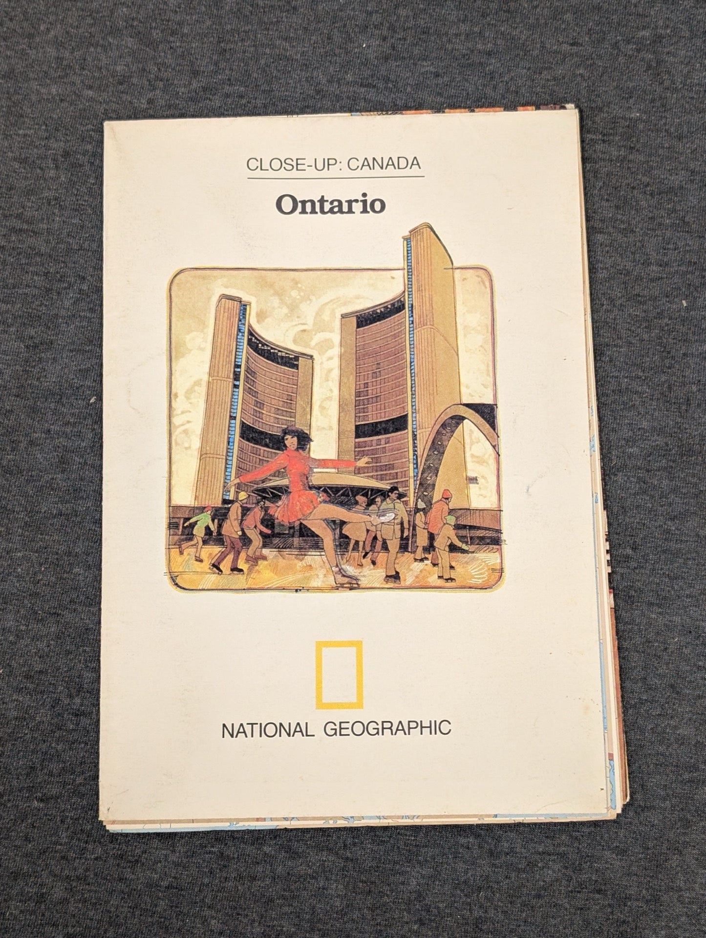 National Geographic Close-Up Canada Ontario featuring ice skaters at Toronto City Hall.