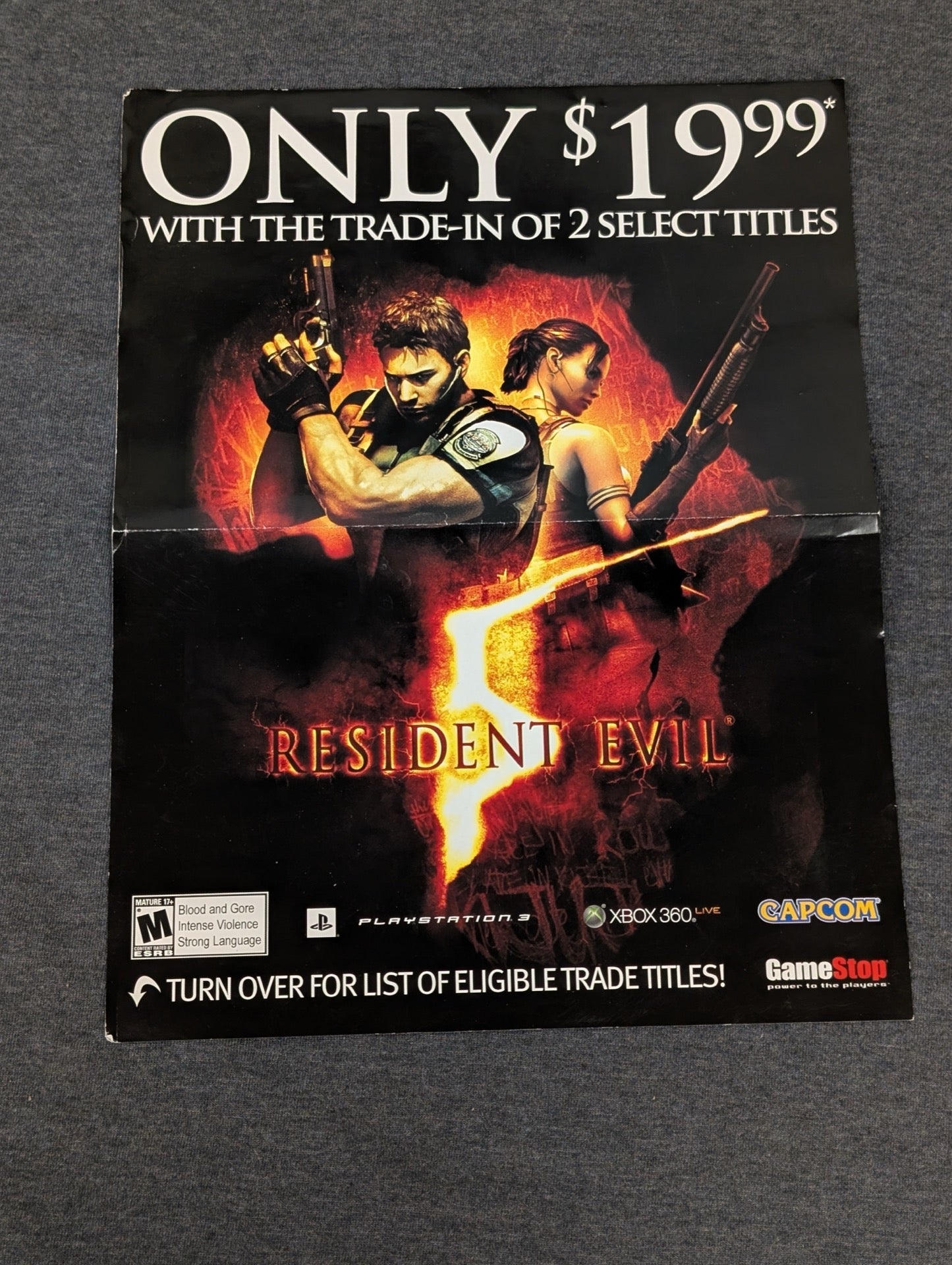 Resident Evil 5 GameStop promotional flyer advertising $19.99 price