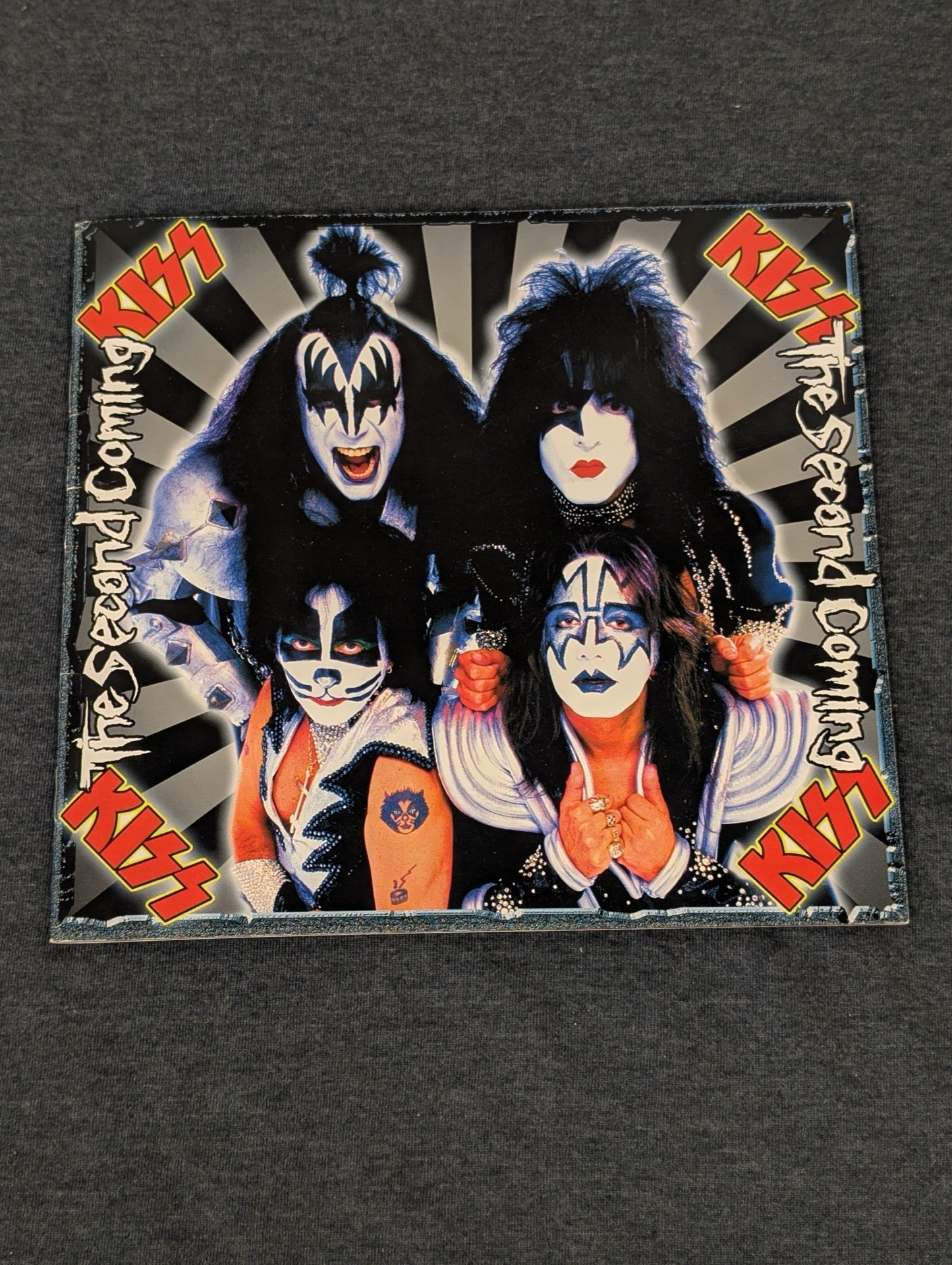 KISS The Second Coming memorabilia featuring the band in full makeup.