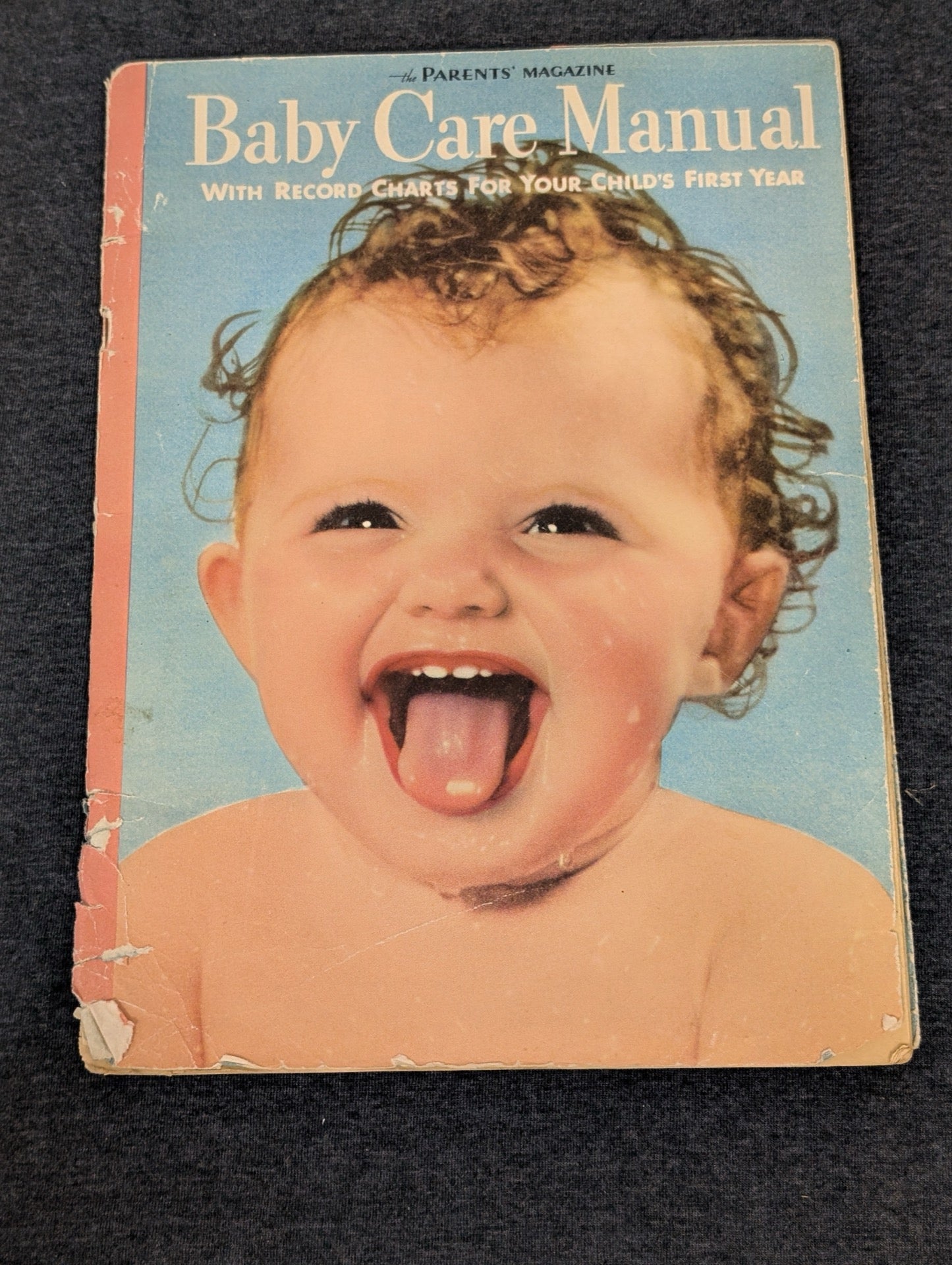 Vintage Parents' Magazine Baby Care Manual with a smiling baby on the cover.