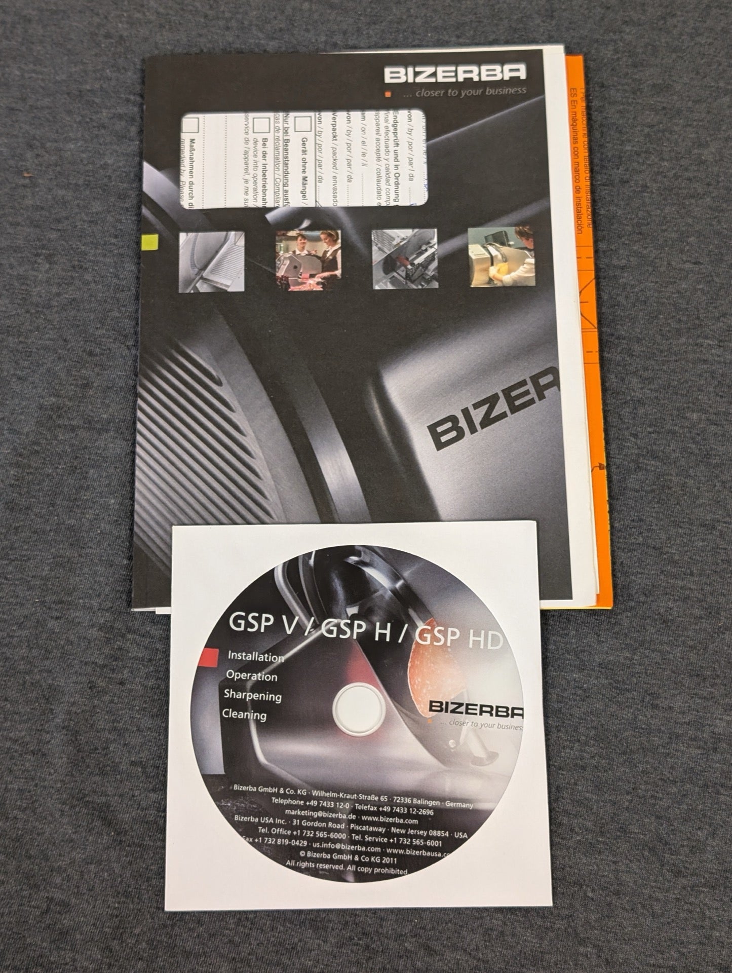 Bizerba manual and CD for GSP V, GSP H, and GSP HD slicers.