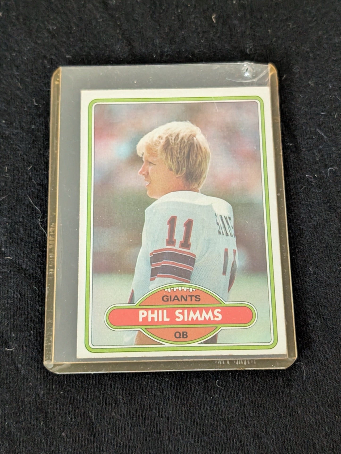 1980 Topps Phil Simms #225 Rookie Card featuring the NY Giants quarterback.