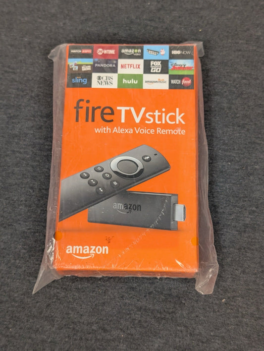 Sealed orange box of an Amazon Fire TV Stick