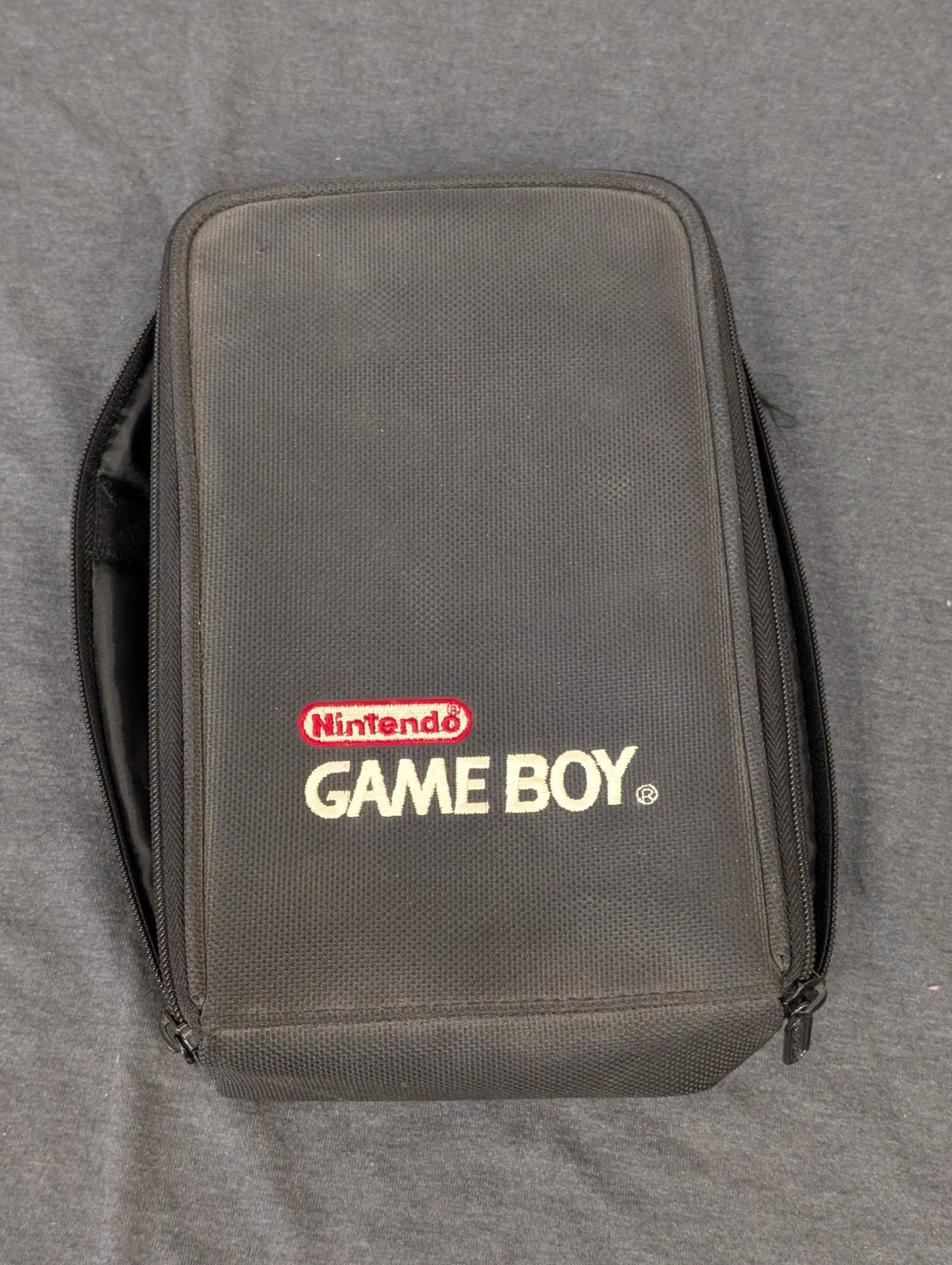 Black canvas carrying case with official Nintendo Game Boy logo