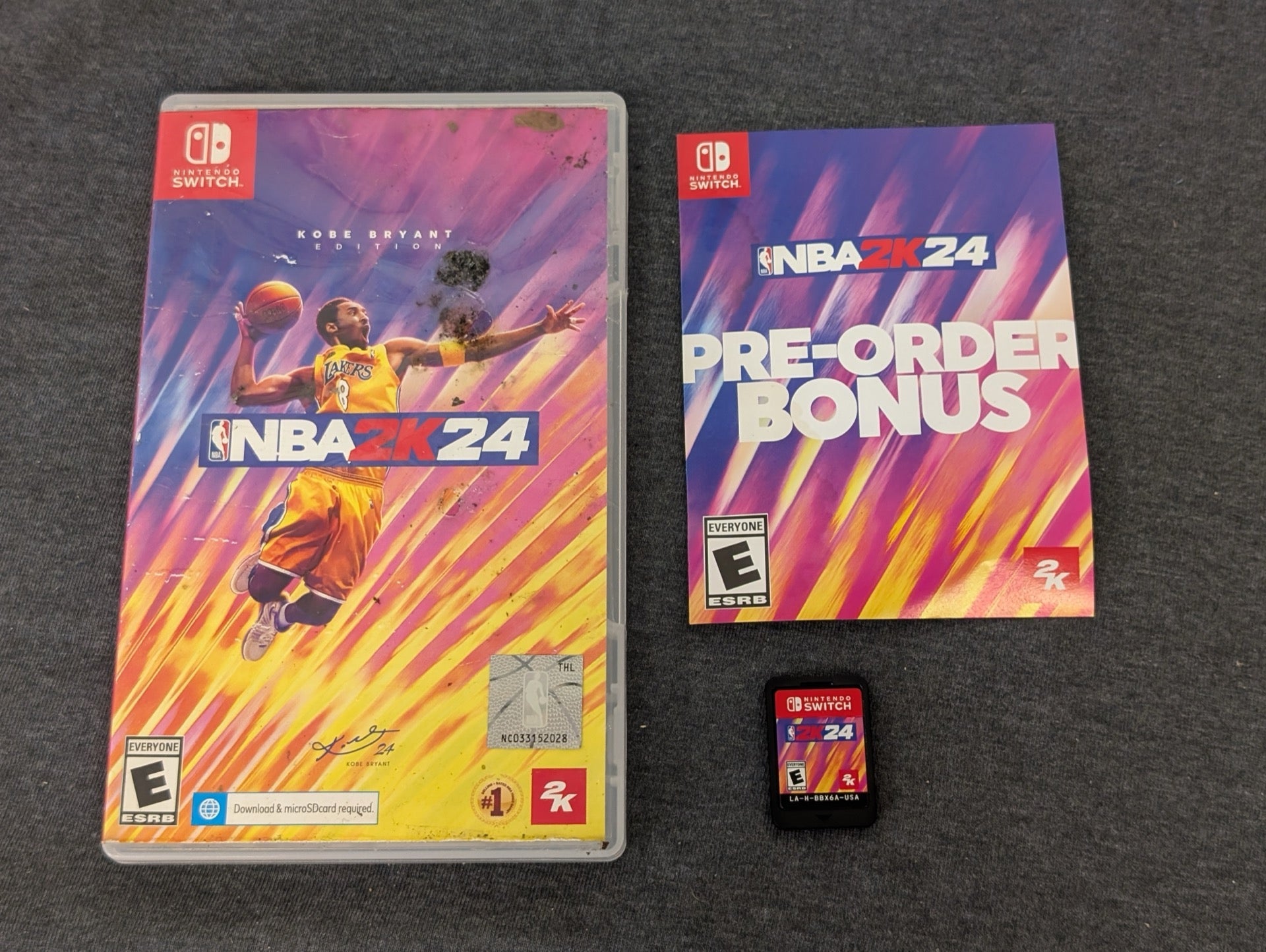 NBA 2K24 Kobe Bryant Edition Switch game case with damage and cartridge