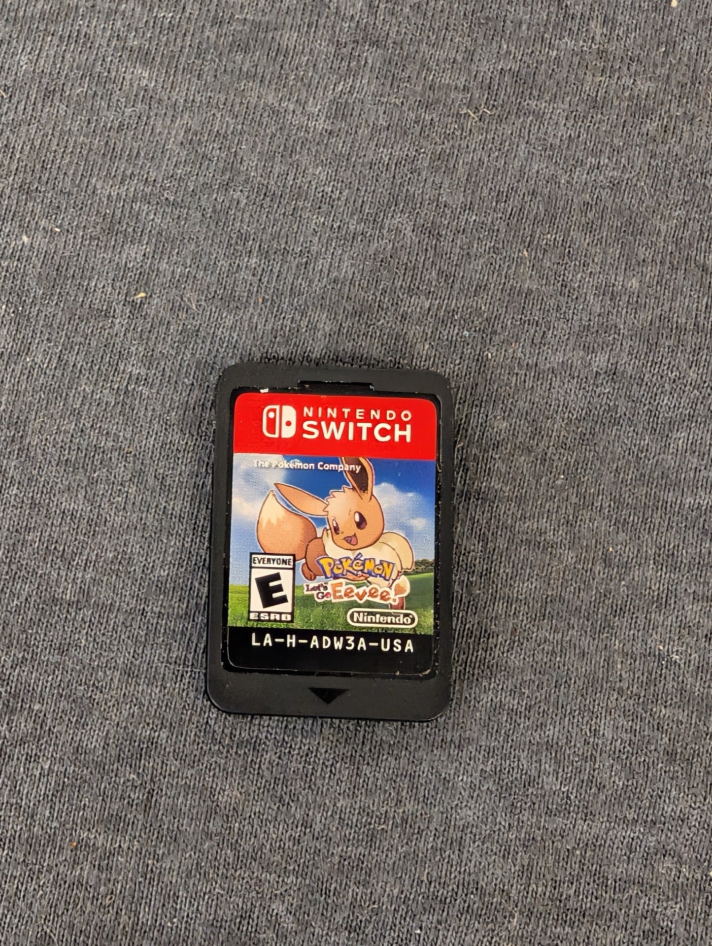 Pokemon Let's Go Eevee Nintendo Switch game cartridge