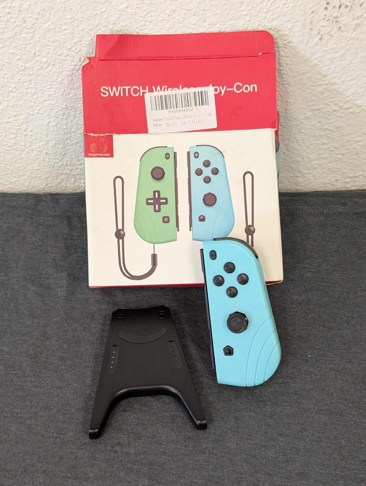 Boxed green and blue RegeMoudal wireless Joy-Con controllers