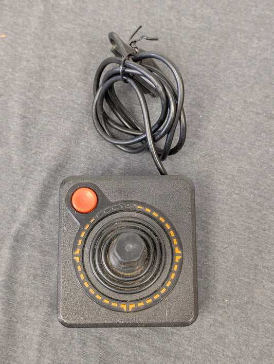 Top-down view of a single vintage Atari CX40 joystick.