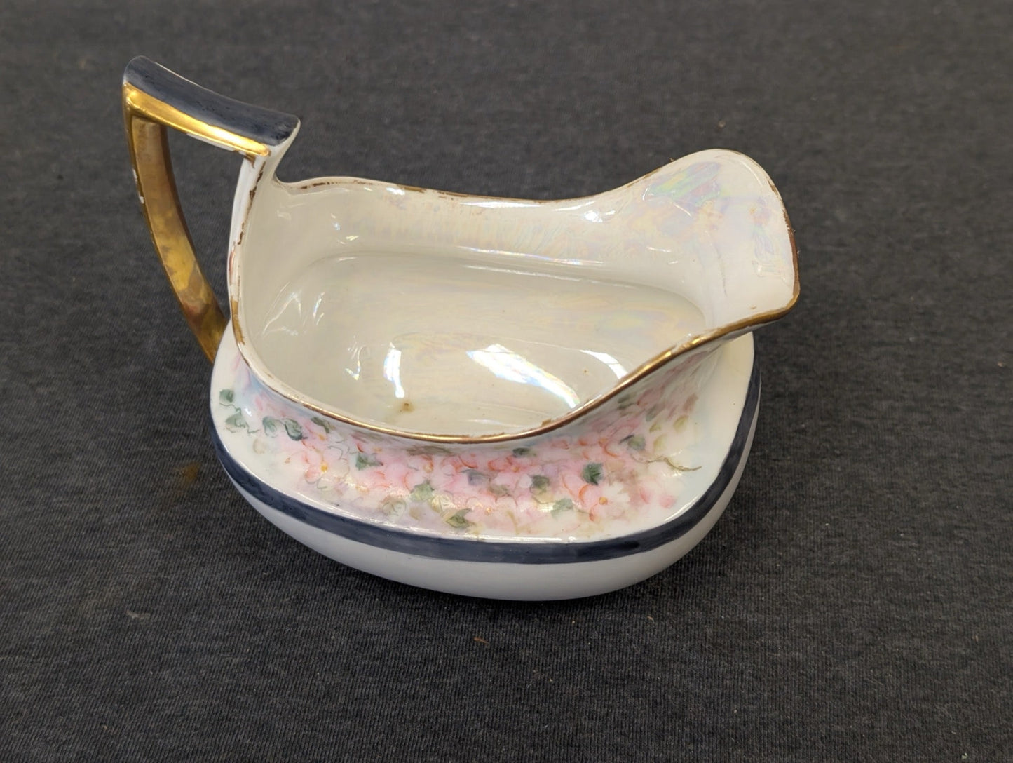 Antique Favorite Bavaria creamer pitcher with pink flowers and a gold handle