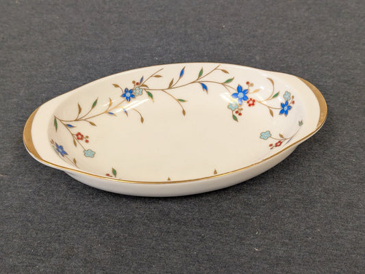 Front view of a vintage Irodori Japan porcelain dish highlighting the floral interior.