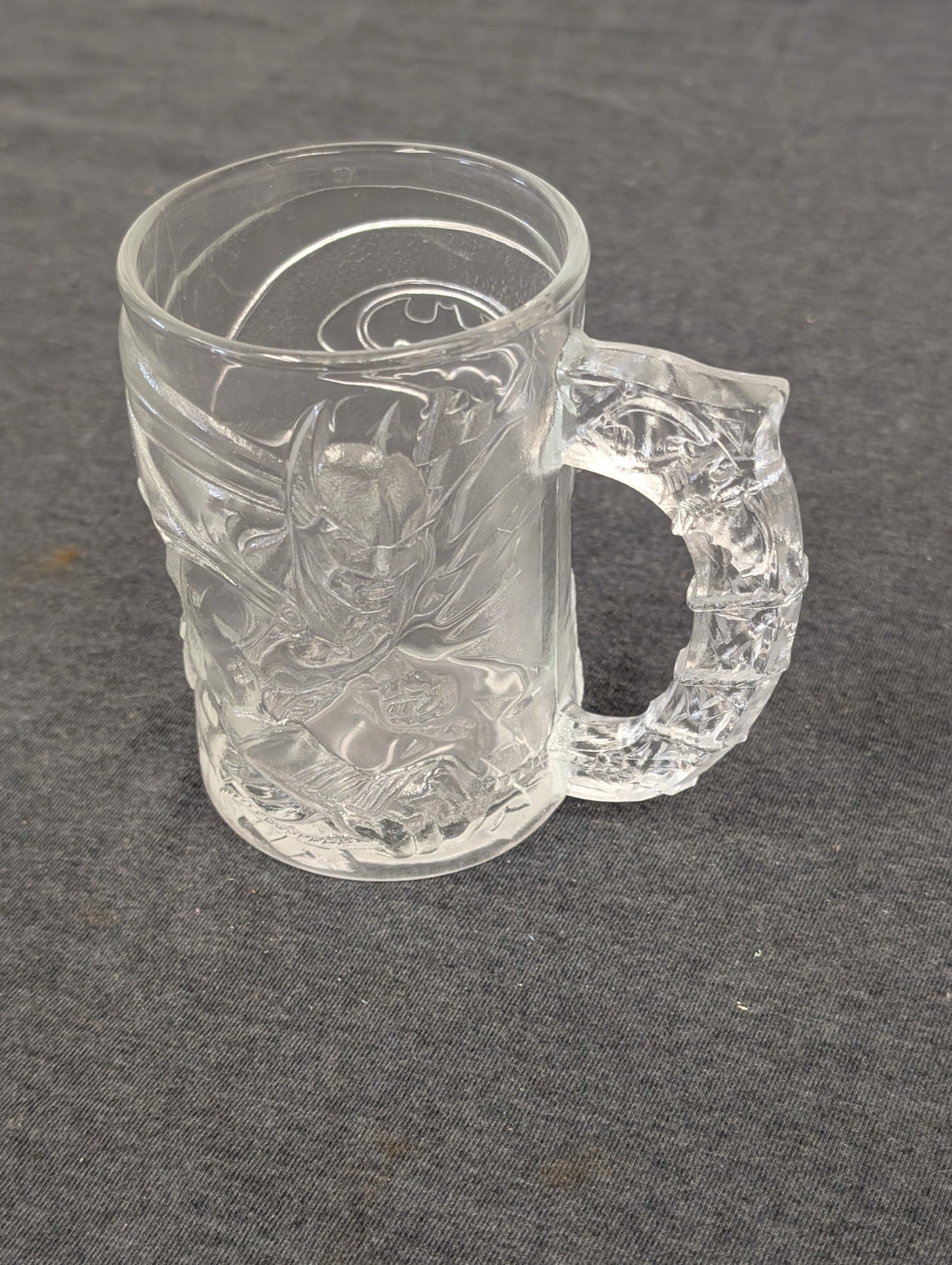 Clear vintage 1995 McDonald's Batman Forever embossed glass mug.