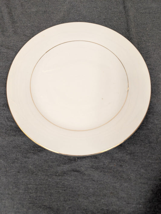 Vintage Sakura Classic Gold round dinner plate showing white surface.