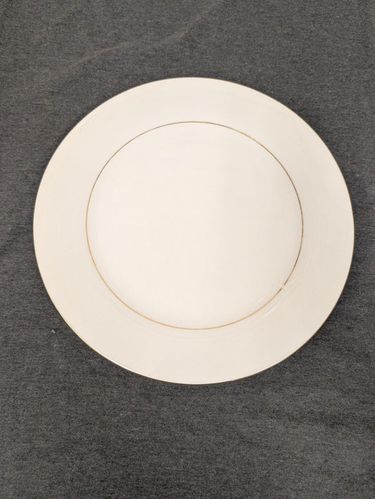 Minimalist view of the white and gold Sakura dinner plate.