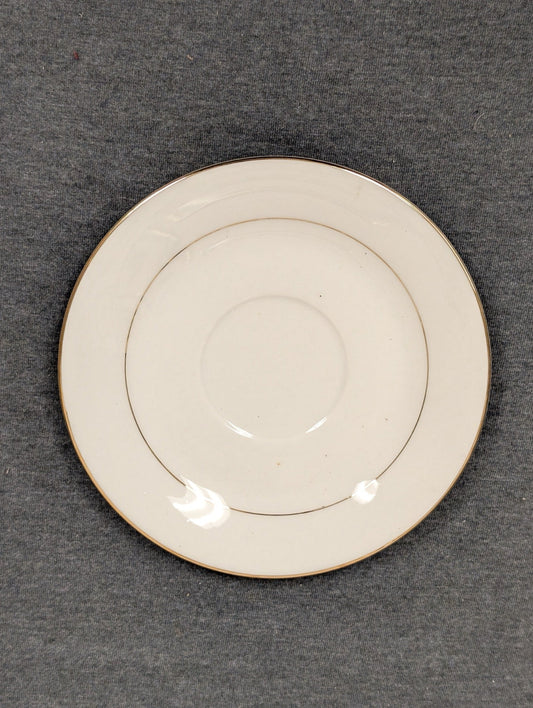 Top view of Sakura Classic Gold saucer showing inner gold ring