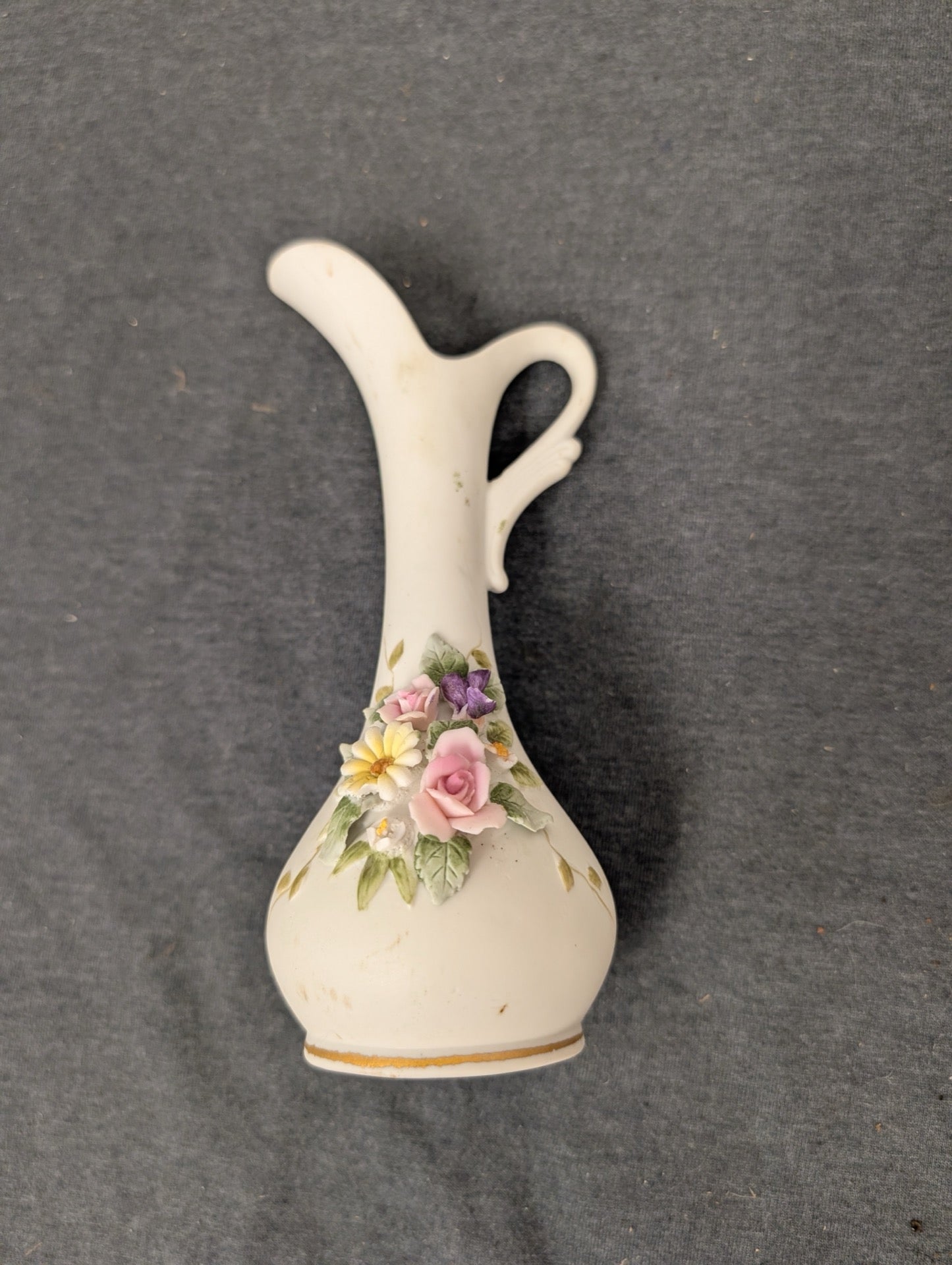 Small white porcelain bud vase with applied pink and yellow roses
