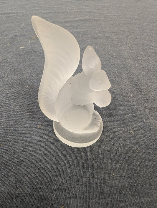 Frosted glass squirrel figurine sitting upright on a round base