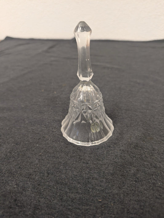 Vintage clear cut crystal decorative bell featuring diamond patterns and a solid glass handle.