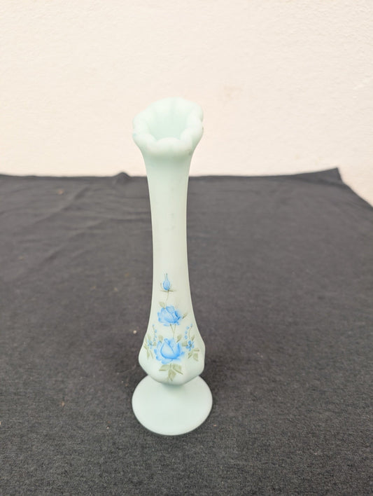 Tall, slender light blue milk glass vase with hand-painted blue roses on the bottom bulb.