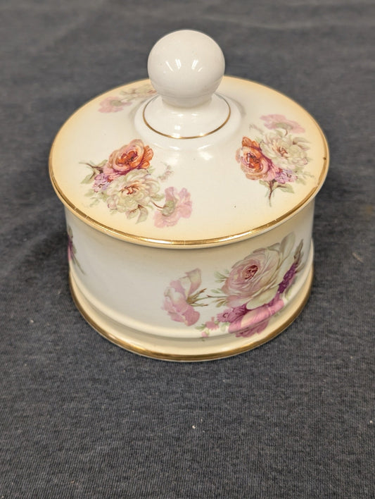 Closed vintage Old Foley porcelain trinket box with delicate floral pink rose motif.