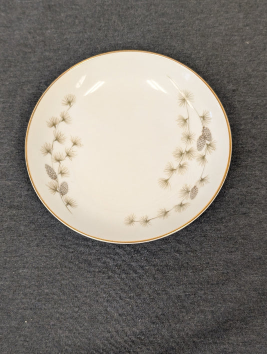 Top-down view of Mikasa Sequoia pattern plate showing delicate pine needles.
