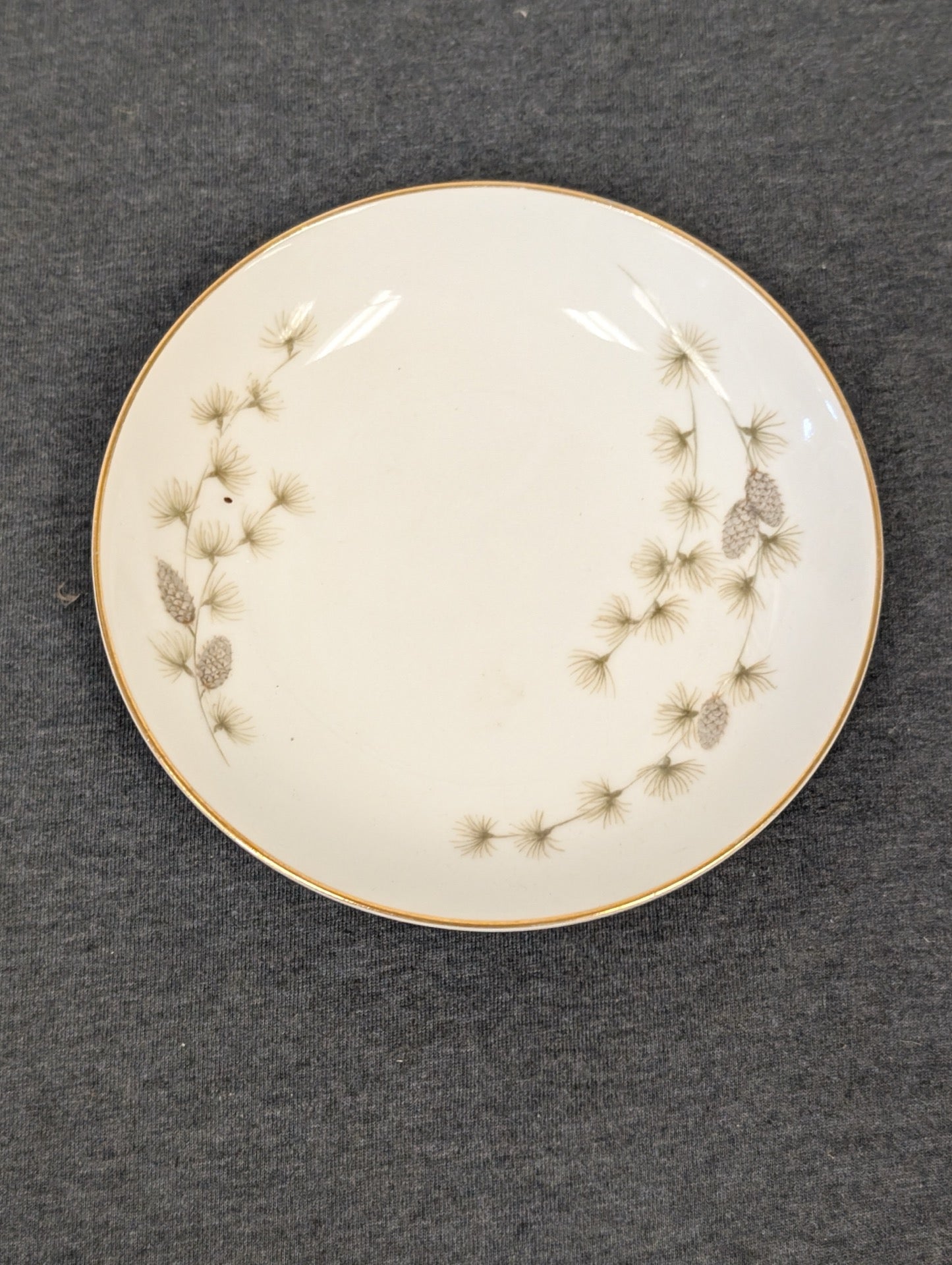 Angled top view showing the glossy finish of the fine china.
