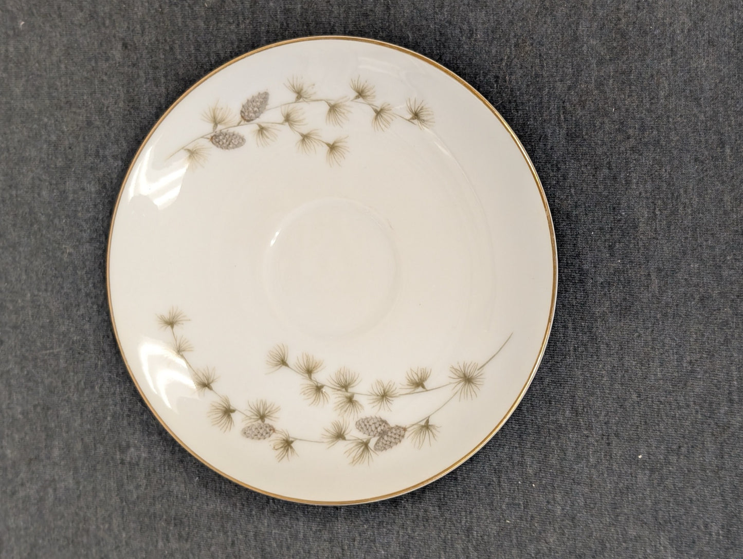 Mikasa Sequoia fine china saucer plate showing gold trim and pine design