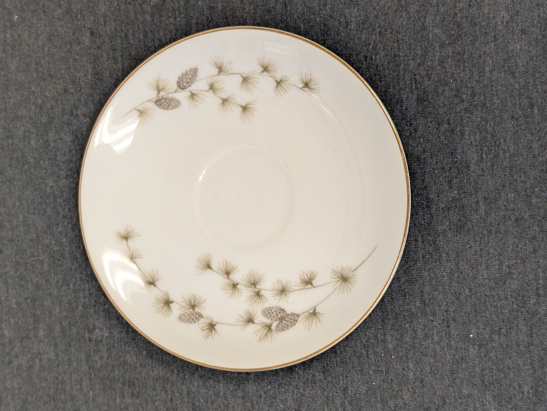 Mikasa Sequoia fine china saucer plate showing gold trim and pine design