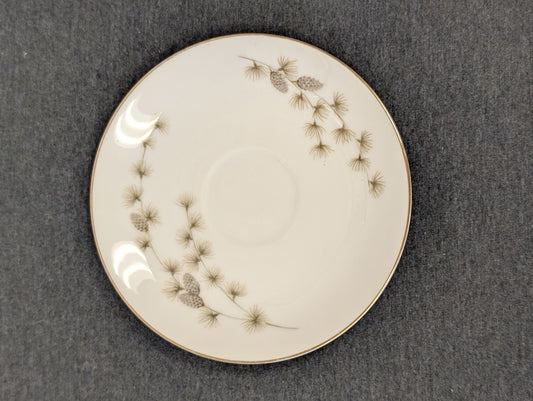 Retro Mikasa fine china saucer showing pine needle and pinecone motifs.